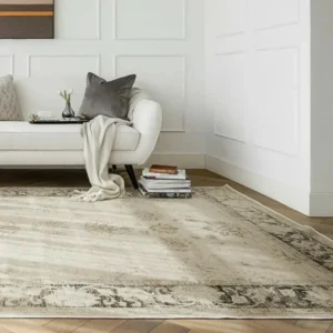 Faded grey-beige rug with abstract wear
