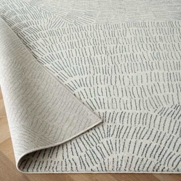 Rug with abstract hand-drawn line design