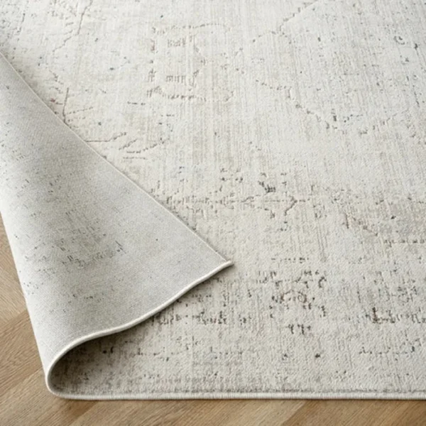 Rug with aged traditional motifs and patterns
