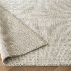Textured rug with subtle grid design