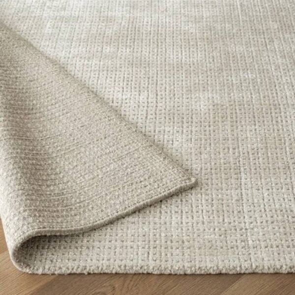 Textured rug with subtle grid design