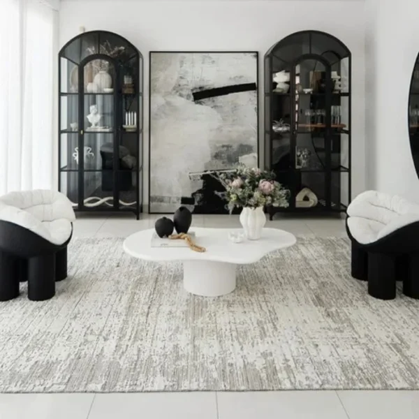 Textured area rug with pottery motifs