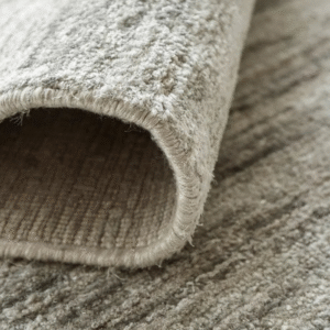 Textured surface rug in bedroom