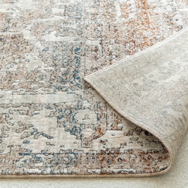 Beige and grey rug with distressed texture