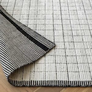 Black and white rug with grid design