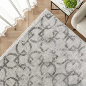 Grey rug with bold geometric shapes