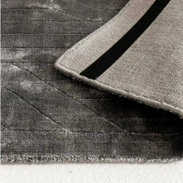 Carved plaited lines rug design