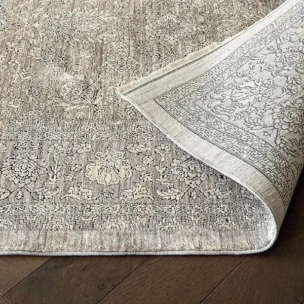 Central medallion rug in living room