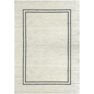 Close-up of black bordered pearl rug