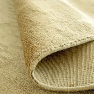 Decorative gold rug with mesh detailing