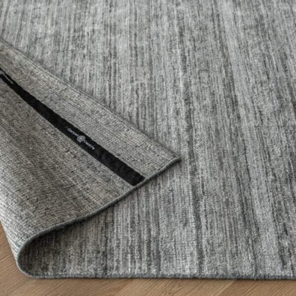 Rug with heavy textured surface pattern