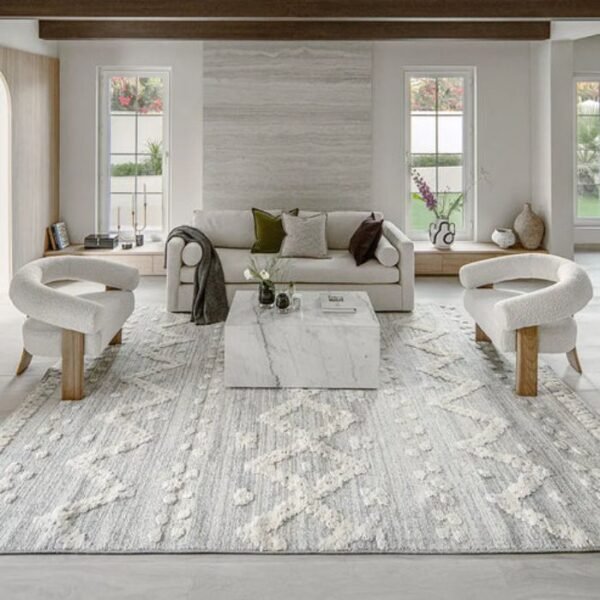 Grey textured rug with shapes