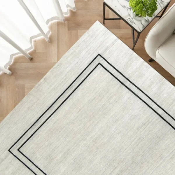 Dining room pearl black bordered rug