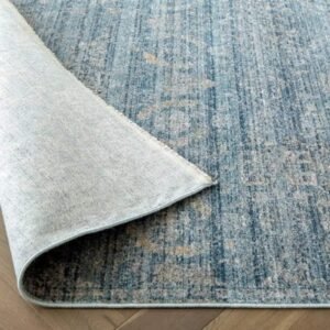 Distressed blue rug in light tones