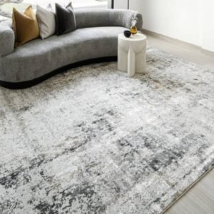 Close-up of faded grey rug surface