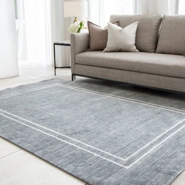 Durable blue and white border rug