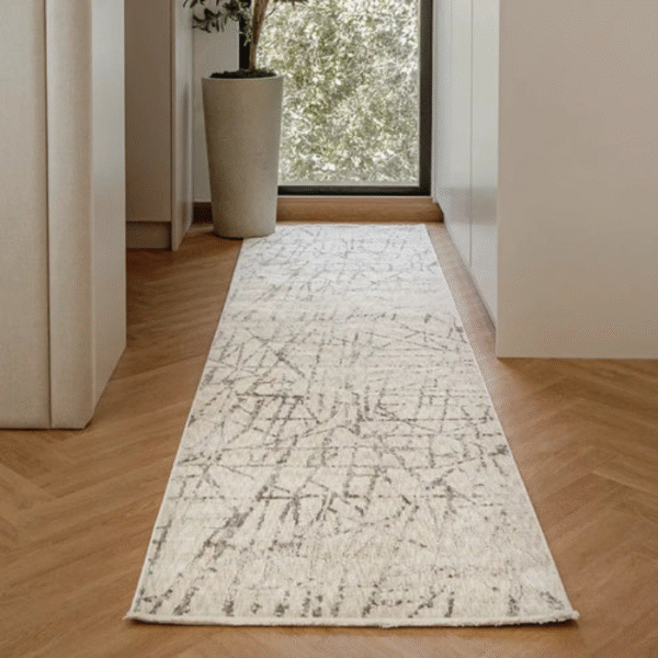 Corner of rug with curved lines