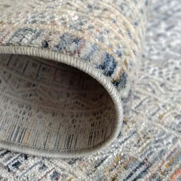 Faded rug with traditional details