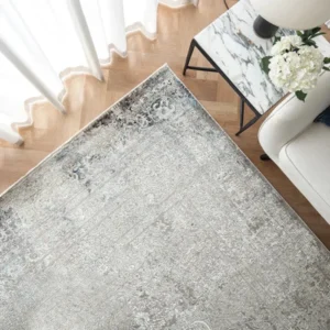 Elegant faded rug in dining area