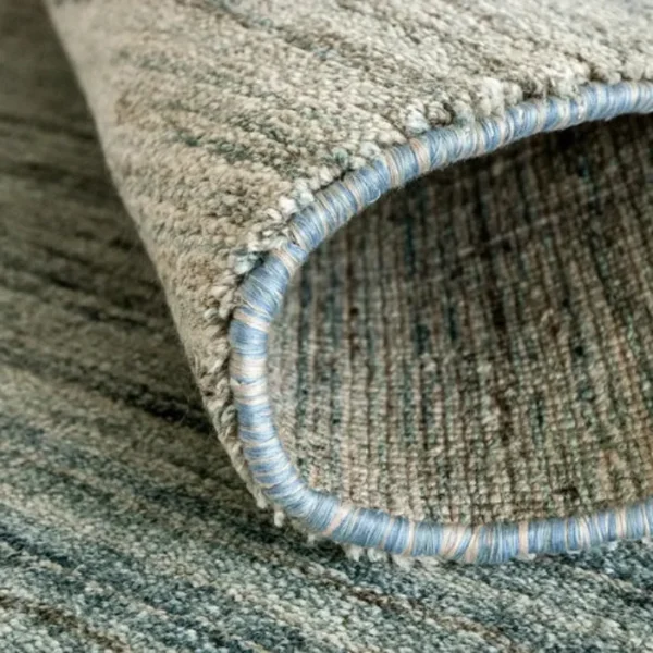 Ombre rug adding depth to bedroom décor