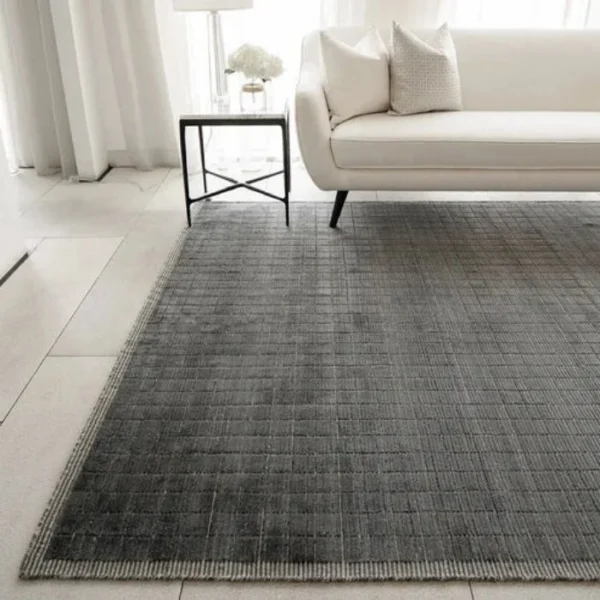 Neutral rug with embossed grid lines