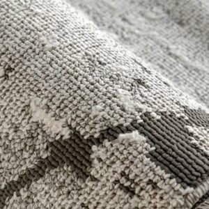 Muted criss-cross design floor rug