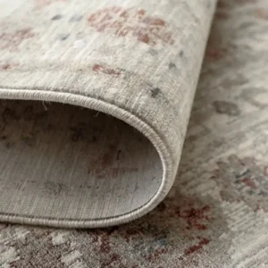 Traditional rug with faded central medallion