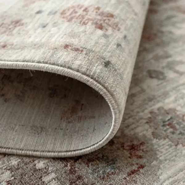 Traditional rug with faded central medallion