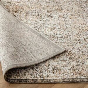 Faded rug with traditional repeating design