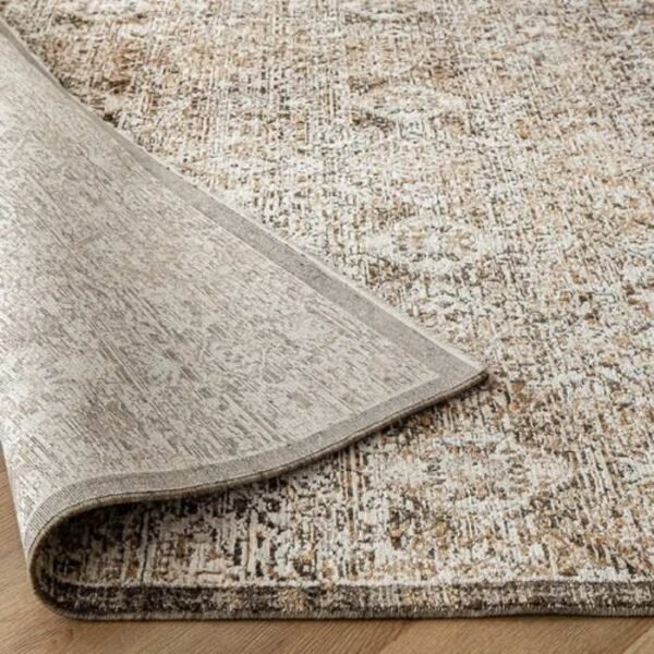 Faded rug with traditional repeating design