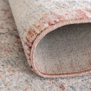 Full view of worn red area rug