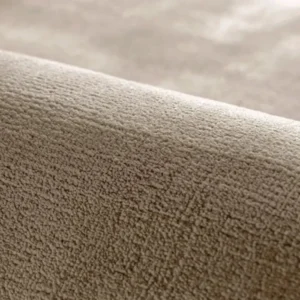 Folded ombré shaded carpet for storage