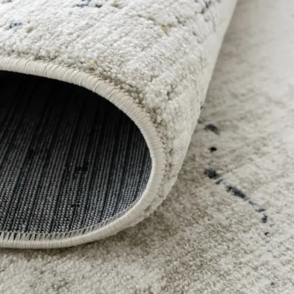 Folded faded patterned traditional rug
