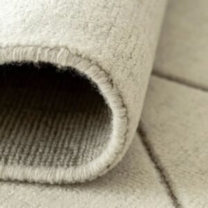 Folded rug showing grid of diamonds