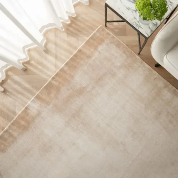 Folded view of ombré stripes rug texture