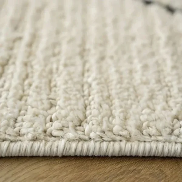 Folded rug with linear pattern