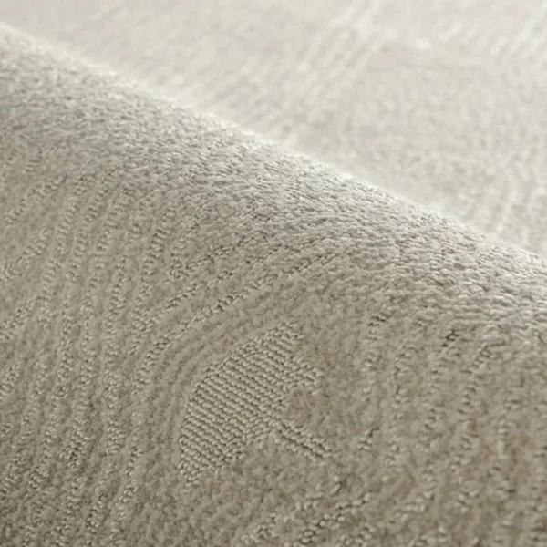 Patterned beige fuzzy carpet rug