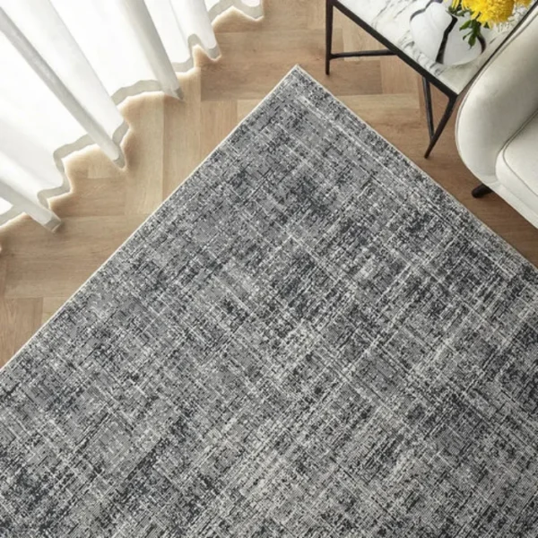 Fuzzy blue rug in dining area