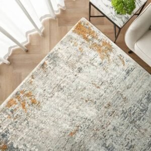 Grey base rug with gold brushstroke pattern