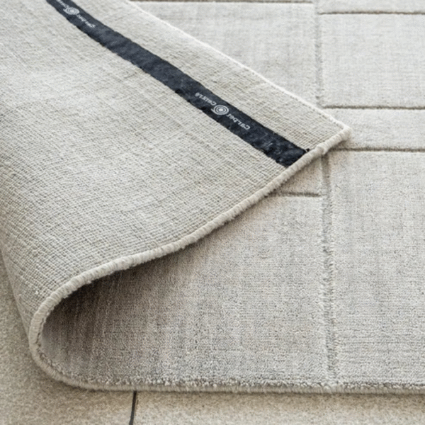 Light grey line rug in living room