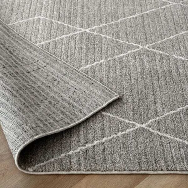 Rug with grey zigzag and diamond stripes