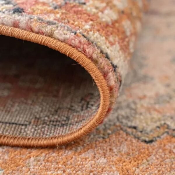 Ornate rug with diamond patterns