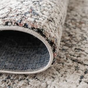 Rug with faded traditional motif design