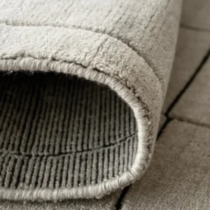 Side angle view showing texture of Irregular Line-drawn Rug