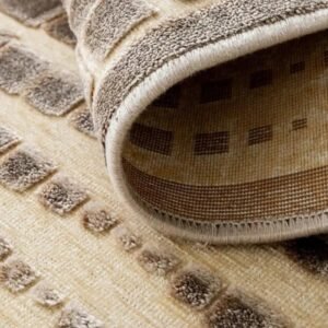 Textured beige rug with ivory details