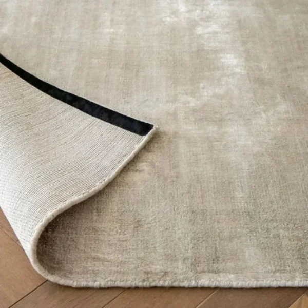 Ombré rug blending soft light tones