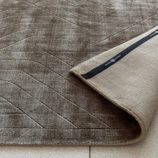Line patterned taupe rug texture