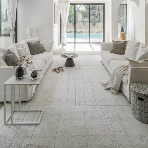 Soft grey rug with raised tufted lines