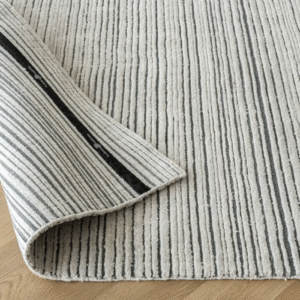 Rug with narrow stripe mixed pile