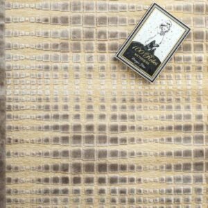 Modern area rug in beige and ivory hues